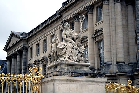 female statue beside building thumbnail