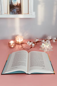 Open book on a pink background thumbnail