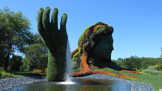 woman and hand topiary panorama photography thumbnail