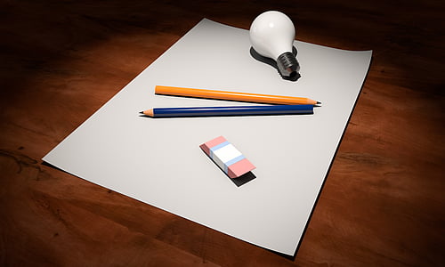 clear light bulb and two blue and yellow pencils thumbnail