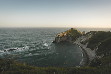 mountains near ocean thumbnail