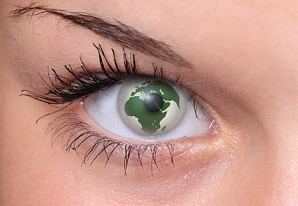 closeup photo of person wearing america continent contact lens thumbnail