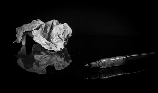 white paper and black pen thumbnail