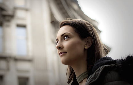 selective focus photography of woman taking selfie thumbnail