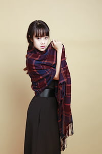 woman wearing red shawl thumbnail