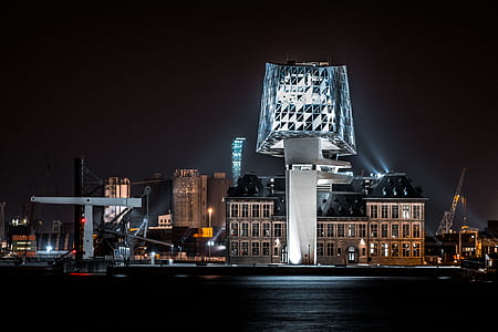 white concrete buildings during night time thumbnail