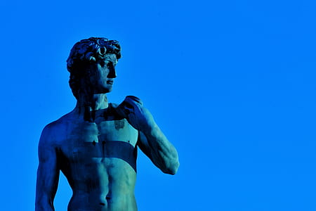 statue of David on blue background thumbnail