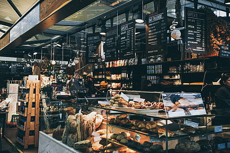 assorted pastries on clear glass display counter thumbnail