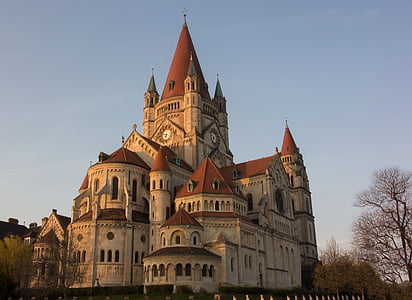 gray and red building with clock tower during daytime thumbnail