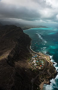 body of water near island at daytime thumbnail
