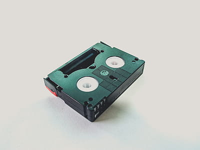 Black Cassette Tape on White Wooden Table thumbnail