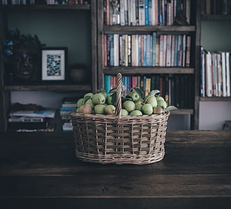 bunch of apples on brown woven basket thumbnail