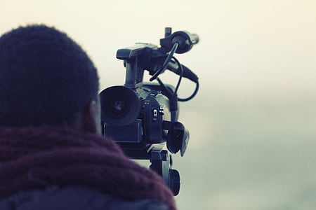 man capturing video thumbnail