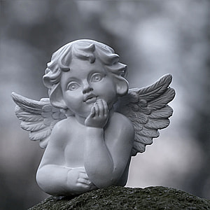 grayscale photo of cherub statuette thumbnail