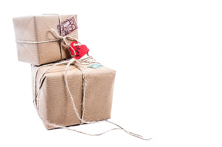 two brown cardboard boxes on top of white surface thumbnail
