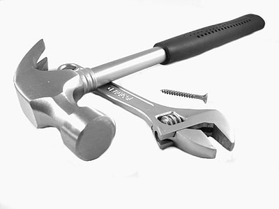 black and gray claw hammer and gray adjustable wrench thumbnail