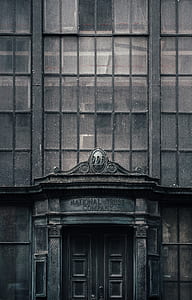 grayscale of gray building door thumbnail