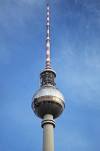 white and orange tower at daytime thumbnail