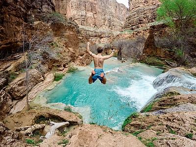 man jumping on mountain thumbnail
