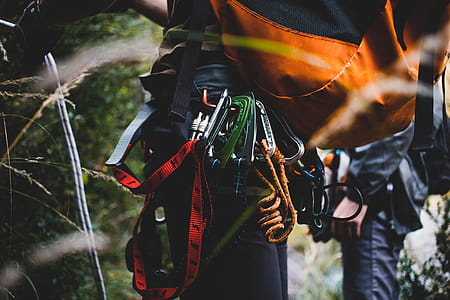 A climber s backpack, carabiner and climbing rope thumbnail
