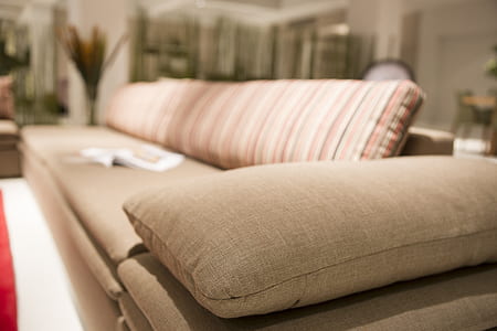 brown fabric sofa in closed-up photo thumbnail