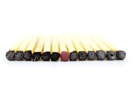 safety matches arrange respectively on white surface thumbnail