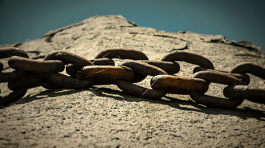 closeup photo of brown metal link chains thumbnail