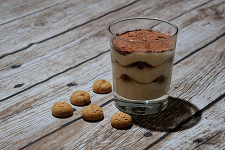 cookies near clear rock glass placed on tabletop thumbnail