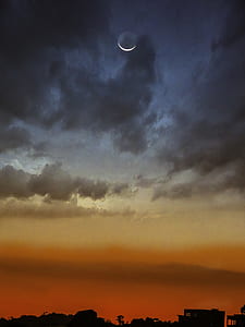 crescent moon and nimbus clouds thumbnail