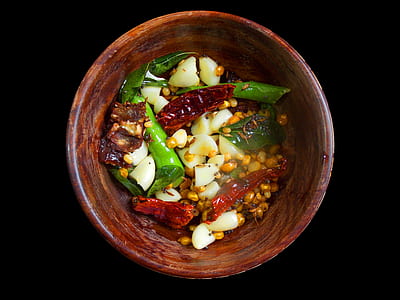 brown ceramic bowl filled with seasonings thumbnail
