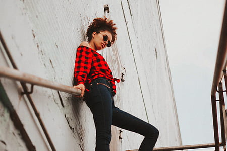 woman standing on stairs thumbnail