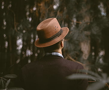 man wearing brown fedora hat thumbnail