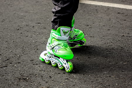 person using green inline skates thumbnail