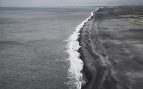 ocean wave under cloudy sky thumbnail
