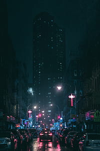 high rise building with lights near street thumbnail