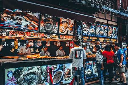 people standing outside a store thumbnail