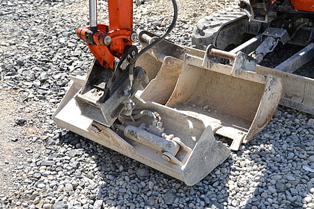 gray and orange heavy equipment thumbnail