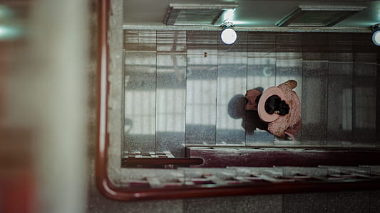 Aerial Photo of Person Walking Stairs thumbnail