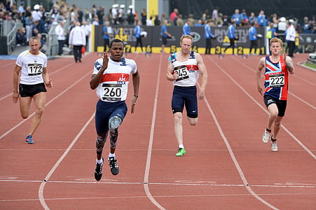 four men doing track and field thumbnail