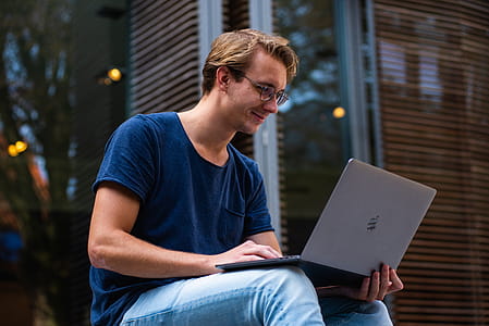 Selective Focus Photo of Man Using Laptop thumbnail