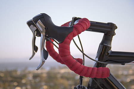 black and red road bike close-up photo thumbnail
