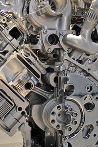 gray vehicle v engine cutaway exposing gears and piston thumbnail