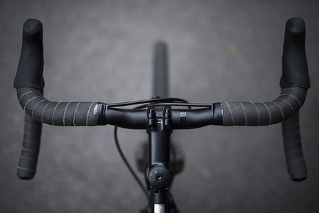 selective focus photography of road bike handlebars thumbnail