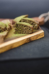 Delicious homemade matcha cake on a wooden board thumbnail