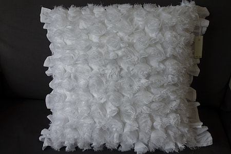 white ruffled throw pillow thumbnail