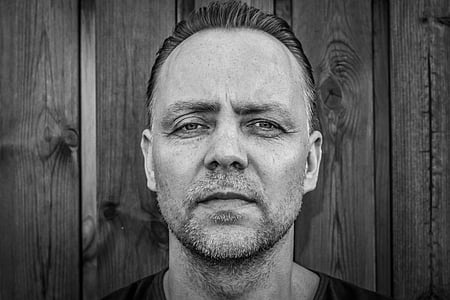 grayscale photo of man's face thumbnail