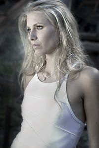 woman wearing white sleeveless top thumbnail