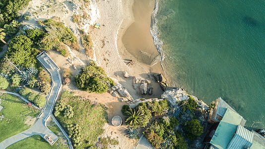 bird's eye view photography of house near seashore thumbnail
