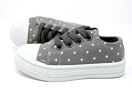 pair of gray-and-white low-top sneakers thumbnail