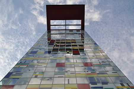 low angle photo of building under blue sky thumbnail